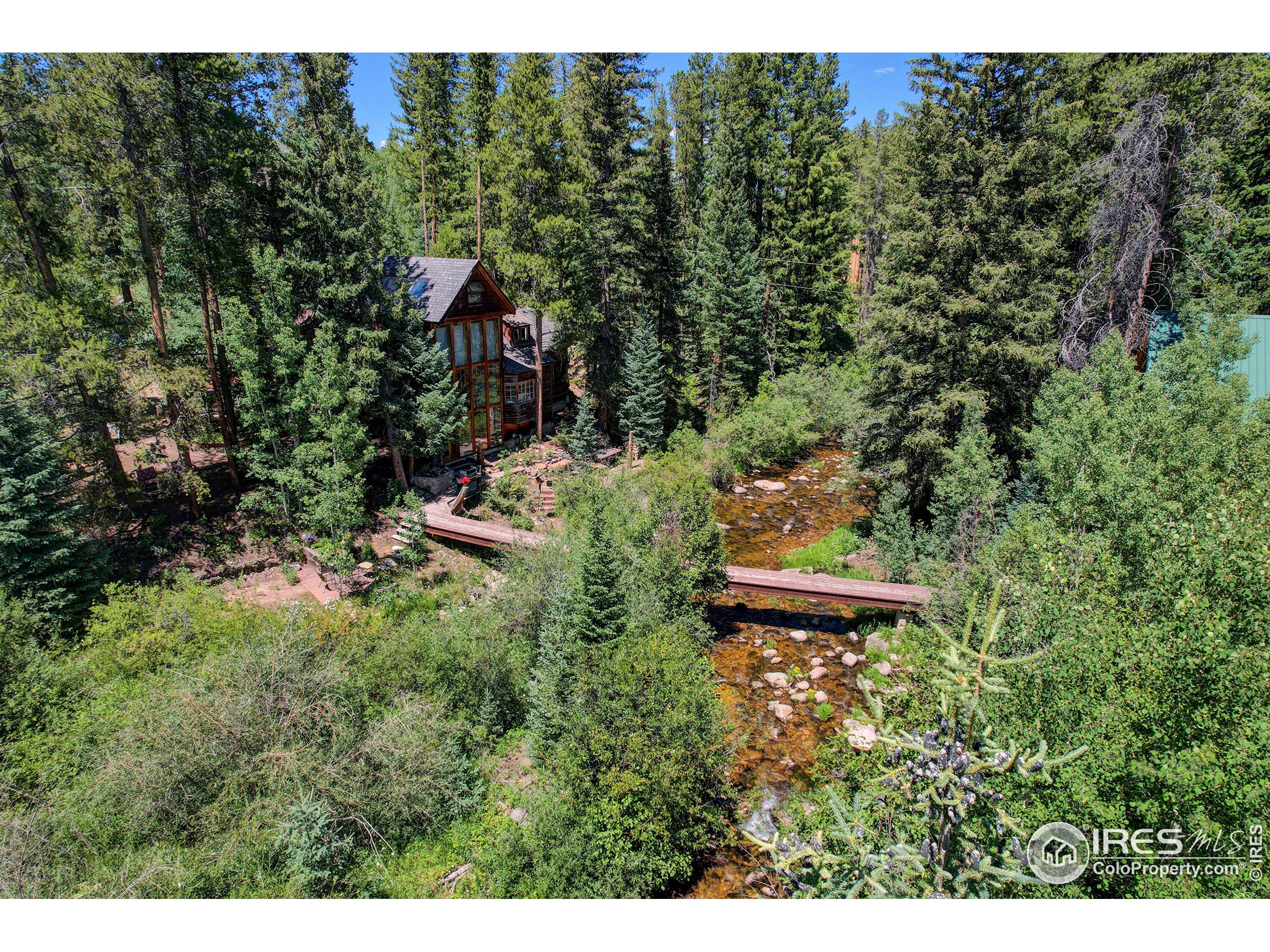 185 Vasquez Road Winter Park, CO 80482 - Photo 10 of 20 a aerial view of a house with a yard