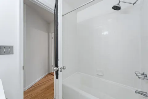 a bathroom with a bathtub