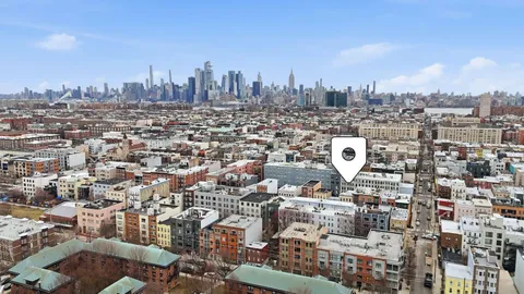 a view of a city with tall buildings