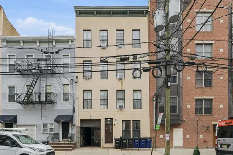 a front view of a building with a street