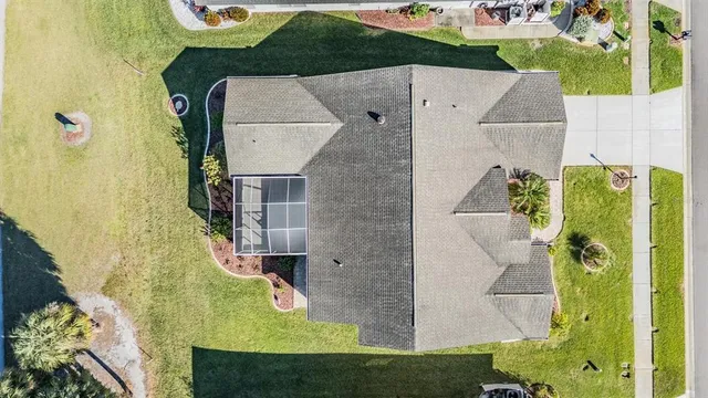 a view of a yard with an ocean view