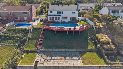 a view of entryway livingroom and hall with wooden floor