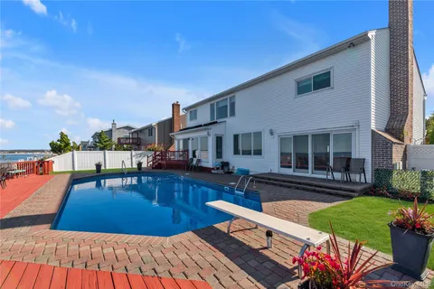 a view of a back yard of the house