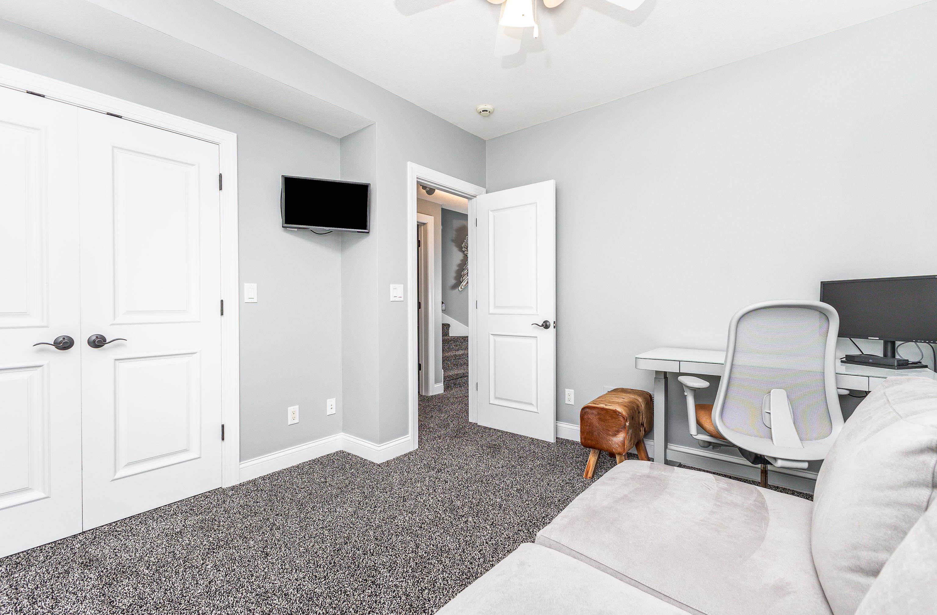 6 Hickory Trail Galena, IL 61036 - Photo 48 of 67 a bedroom with a bed and a television