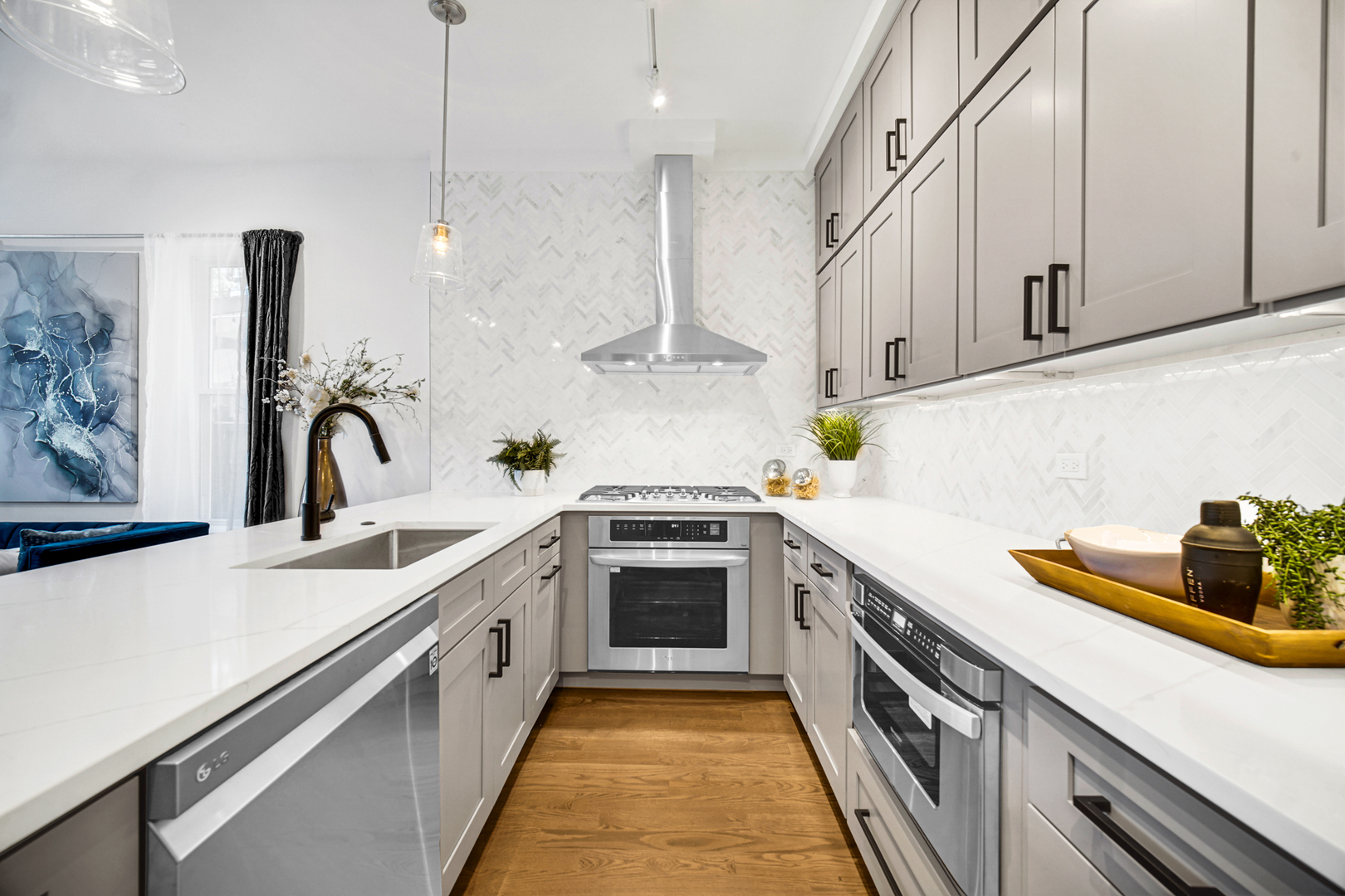 4559 South Michigan Avenue, Unit 2S Chicago, IL 60653 - Photo 18 of 26 a kitchen with stainless steel appliances a sink a stove and cabinets