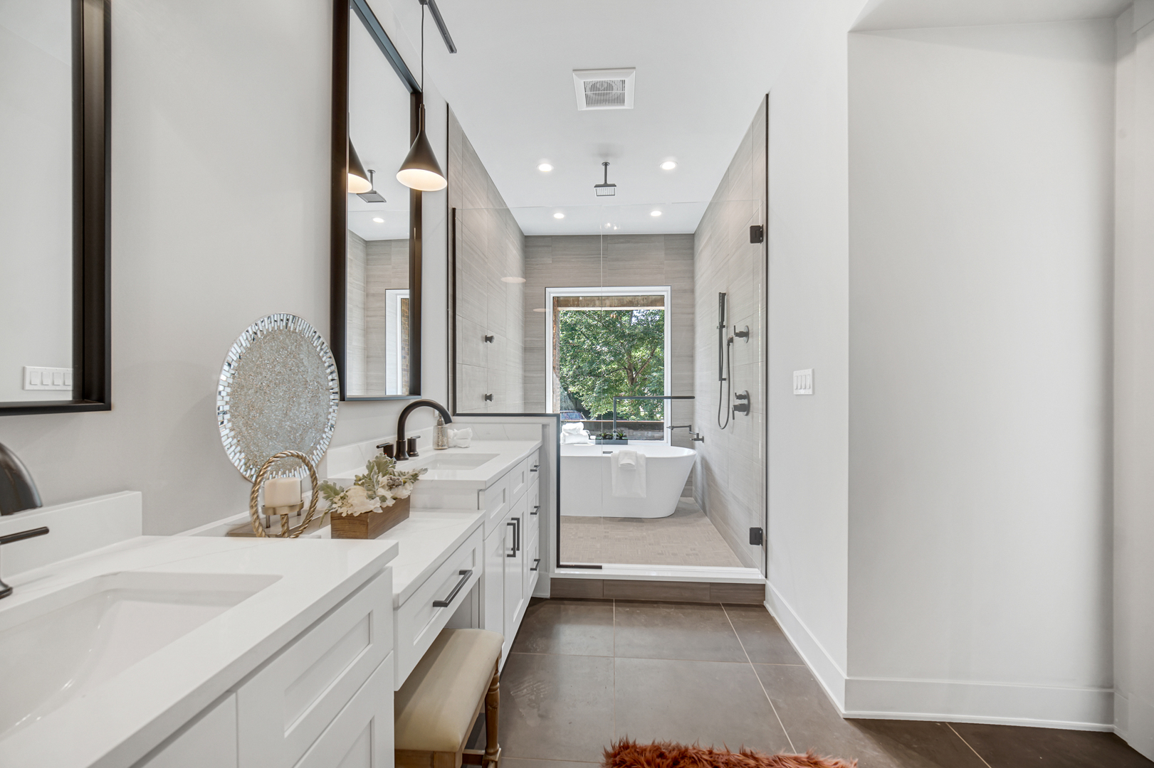 4559 South Michigan Avenue, Unit 2S Chicago, IL 60653 - Photo 2 of 26 a bathroom with a double vanity sink and mirror with bathtub