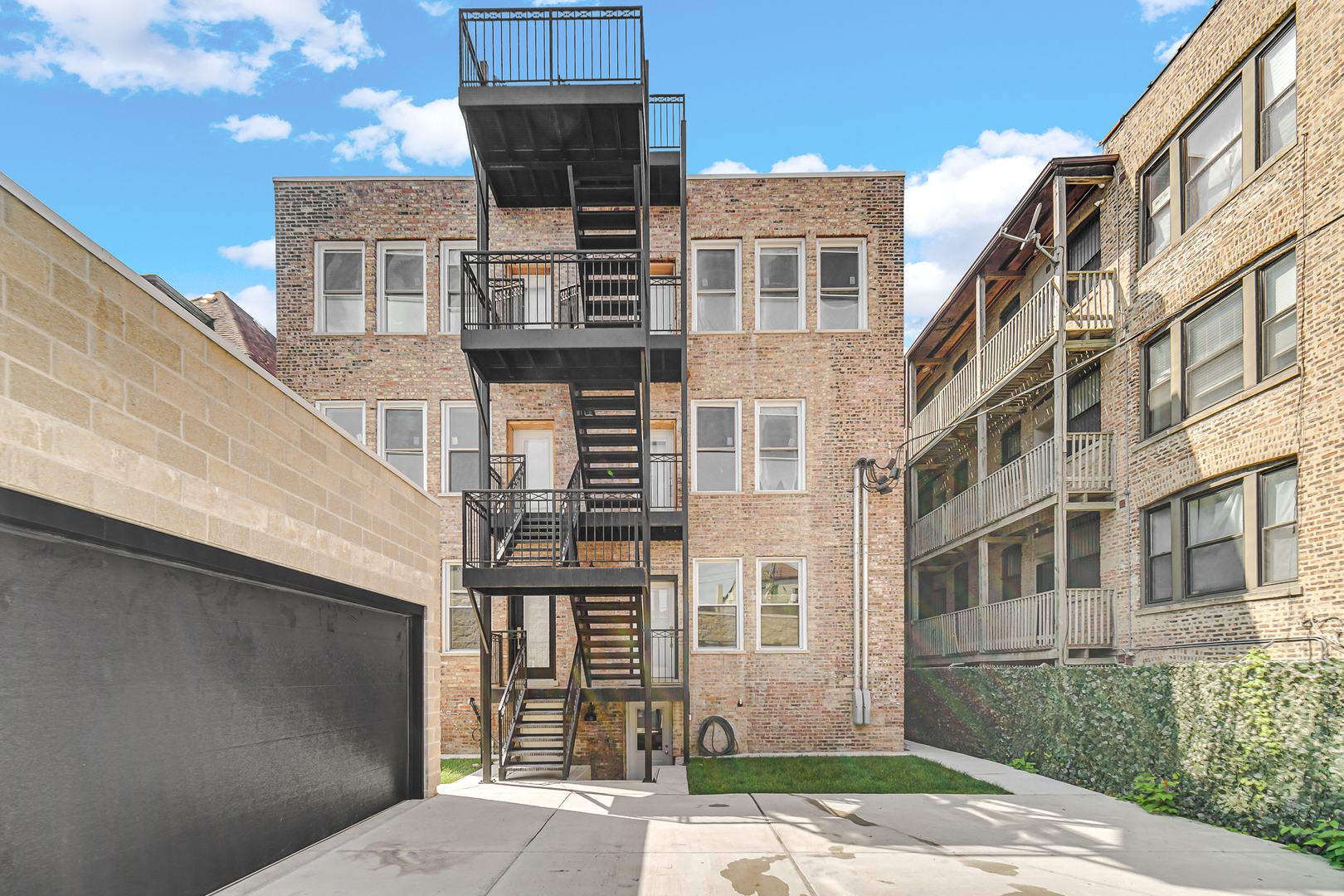 4559 South Michigan Avenue, Unit 2S Chicago, IL 60653 - Photo 24 of 26 a front view of a building with a street