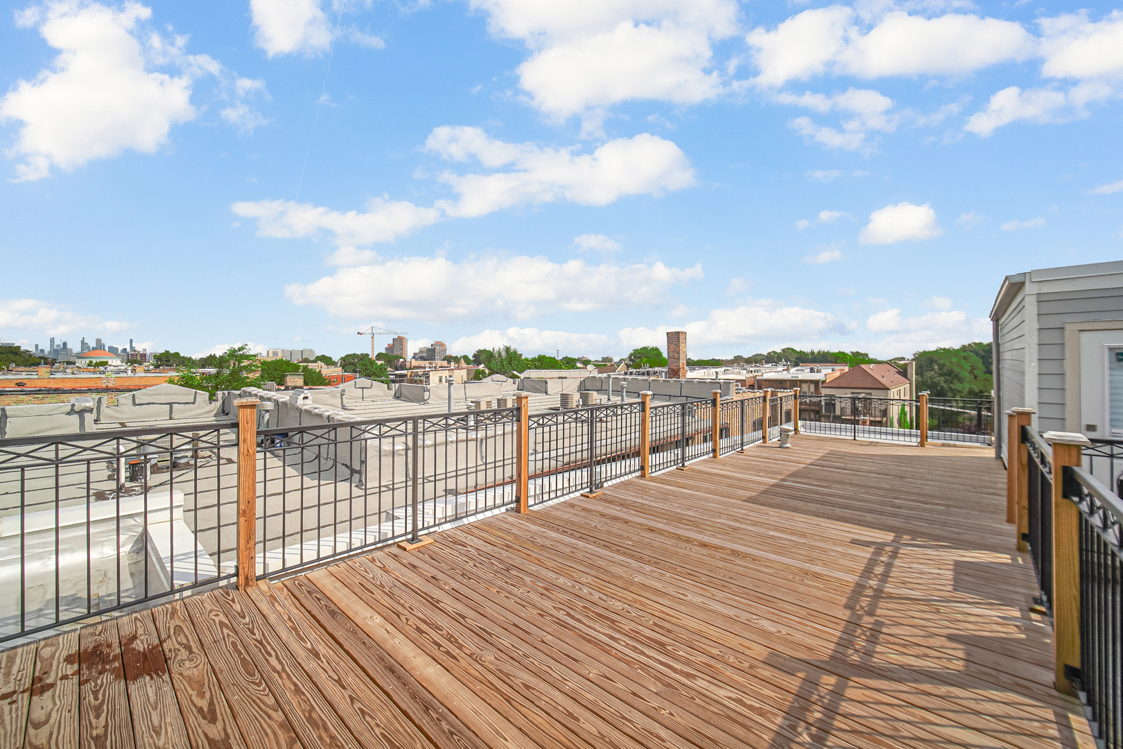 4559 South Michigan Avenue, Unit 2S Chicago, IL 60653 - Photo 25 of 26 a view of roof deck with patio