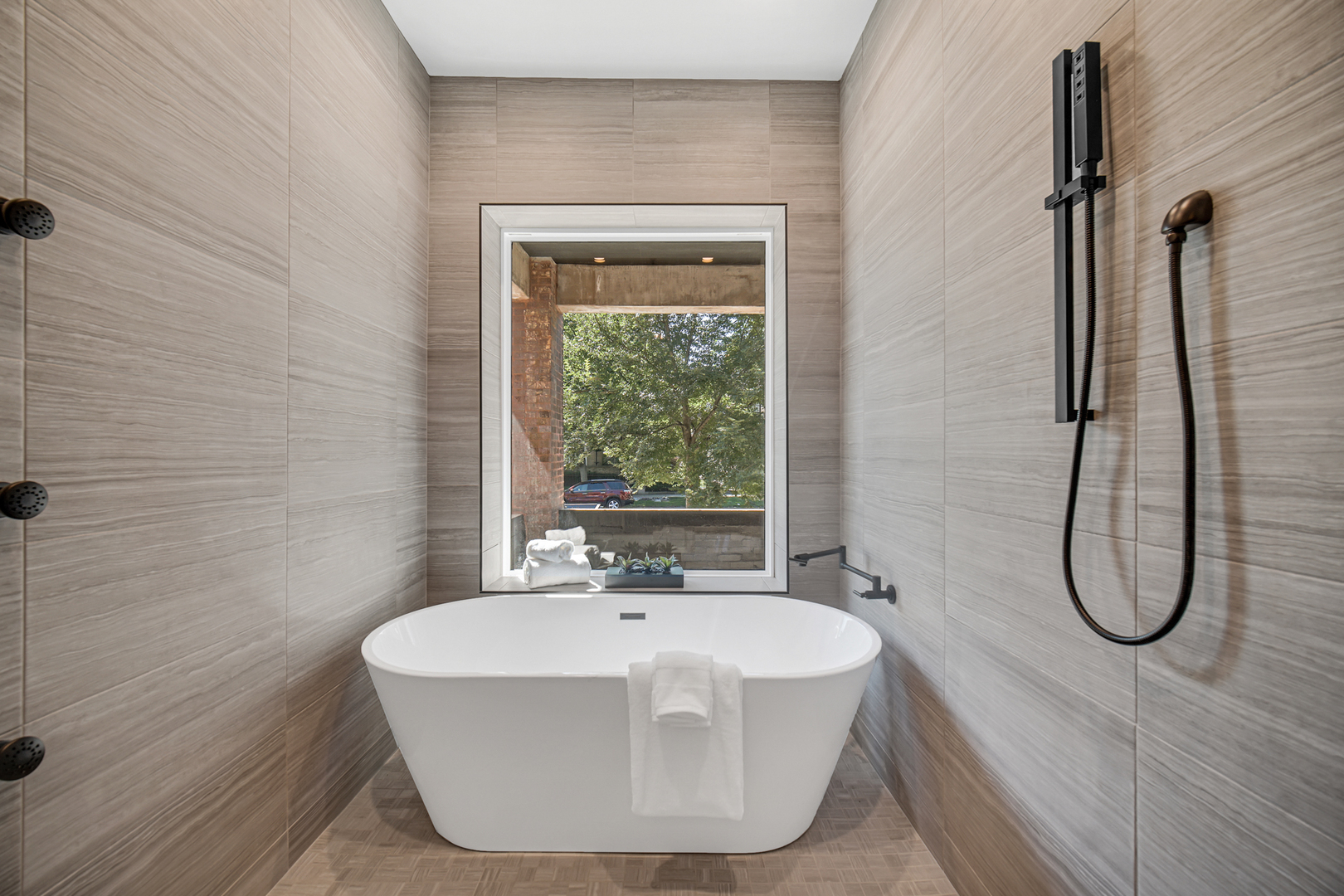 4559 South Michigan Avenue, Unit 2S Chicago, IL 60653 - Photo 4 of 26 a bathroom with a bathtub and a shower