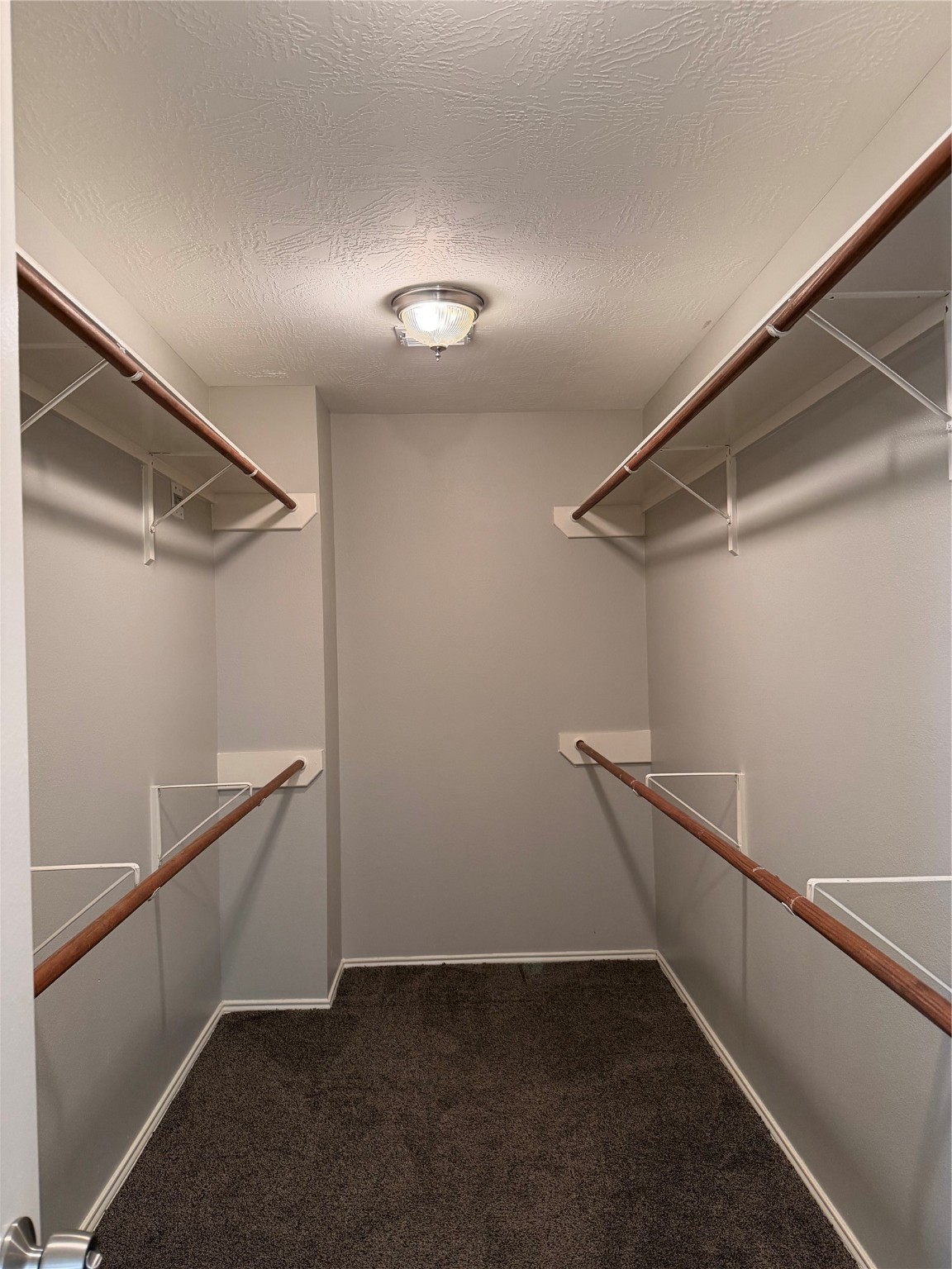 4707 East Parma Drive Rosenberg, TX 77471 - Photo 20 of 24 a view of an empty walk in closet