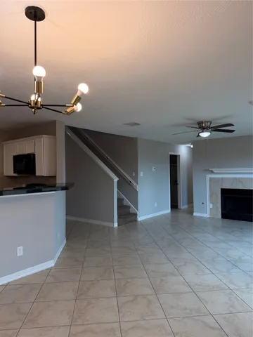 a view of a livingroom with a staircase
