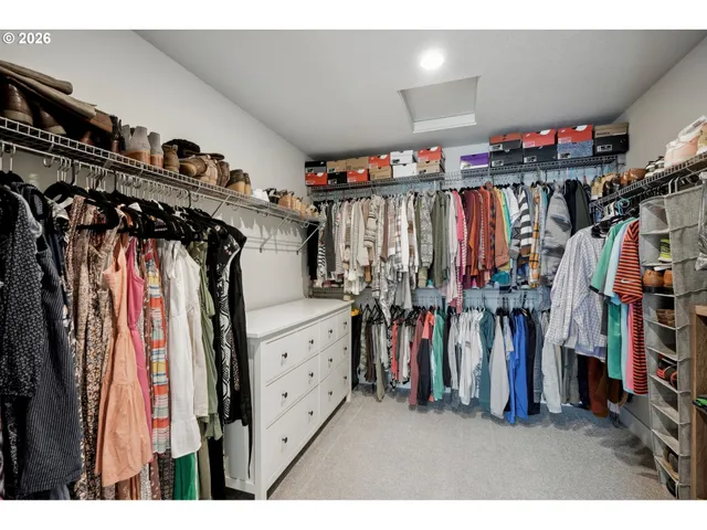 a utility room with sink dryer and washer