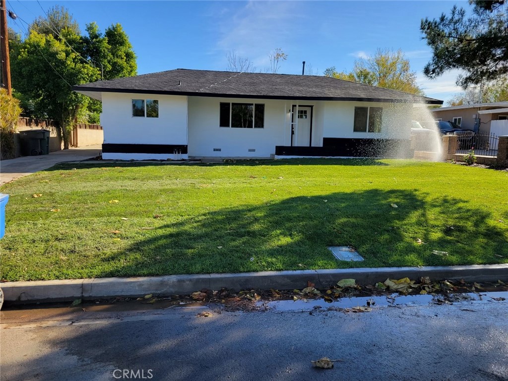 4606 High Street Riverside, CA 92507 - Photo 1 of 1 a front view of a house with garden
