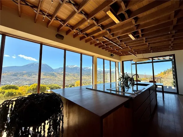 a view of a swimming pool with a roof deck