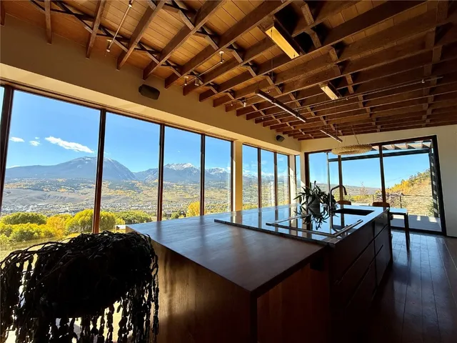 a view of a swimming pool with a roof deck