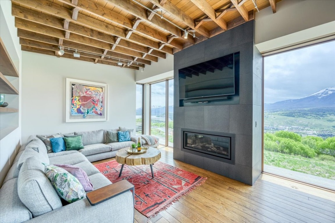 421 Z Road Silverthorne, CO 80498 - Photo 13 of 47 a living room with furniture and a fireplace