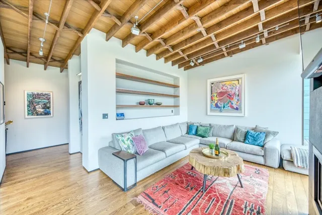 a living room with furniture and a table