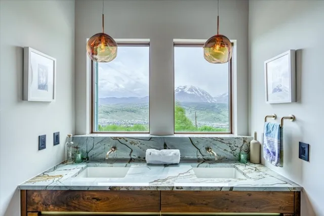 a view of living room with granite countertop furniture and a window