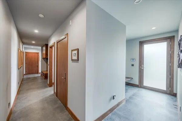 a view of hallway with closet