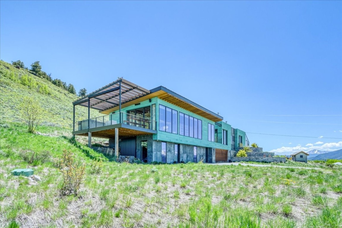 421 Z Road Silverthorne, CO 80498 - Photo 37 of 47 a view of a house with a big yard and large trees