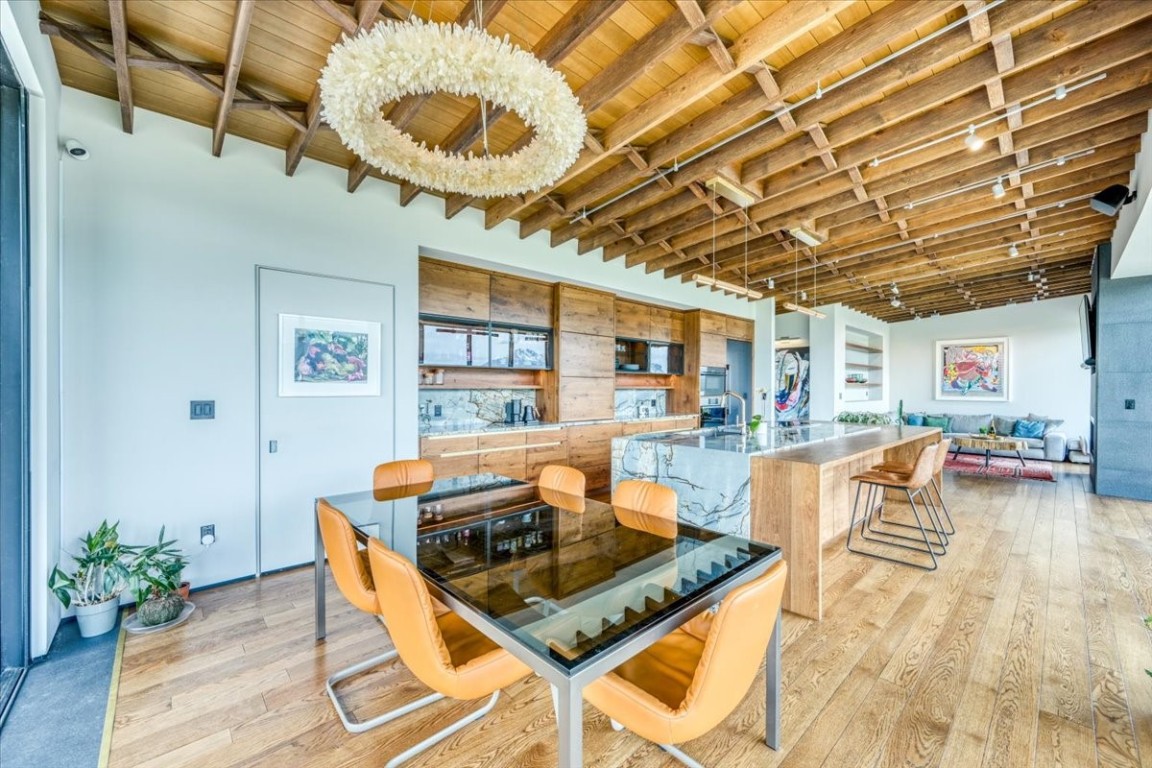 421 Z Road Silverthorne, CO 80498 - Photo 7 of 47 a living room with lots of furniture and a chandelier