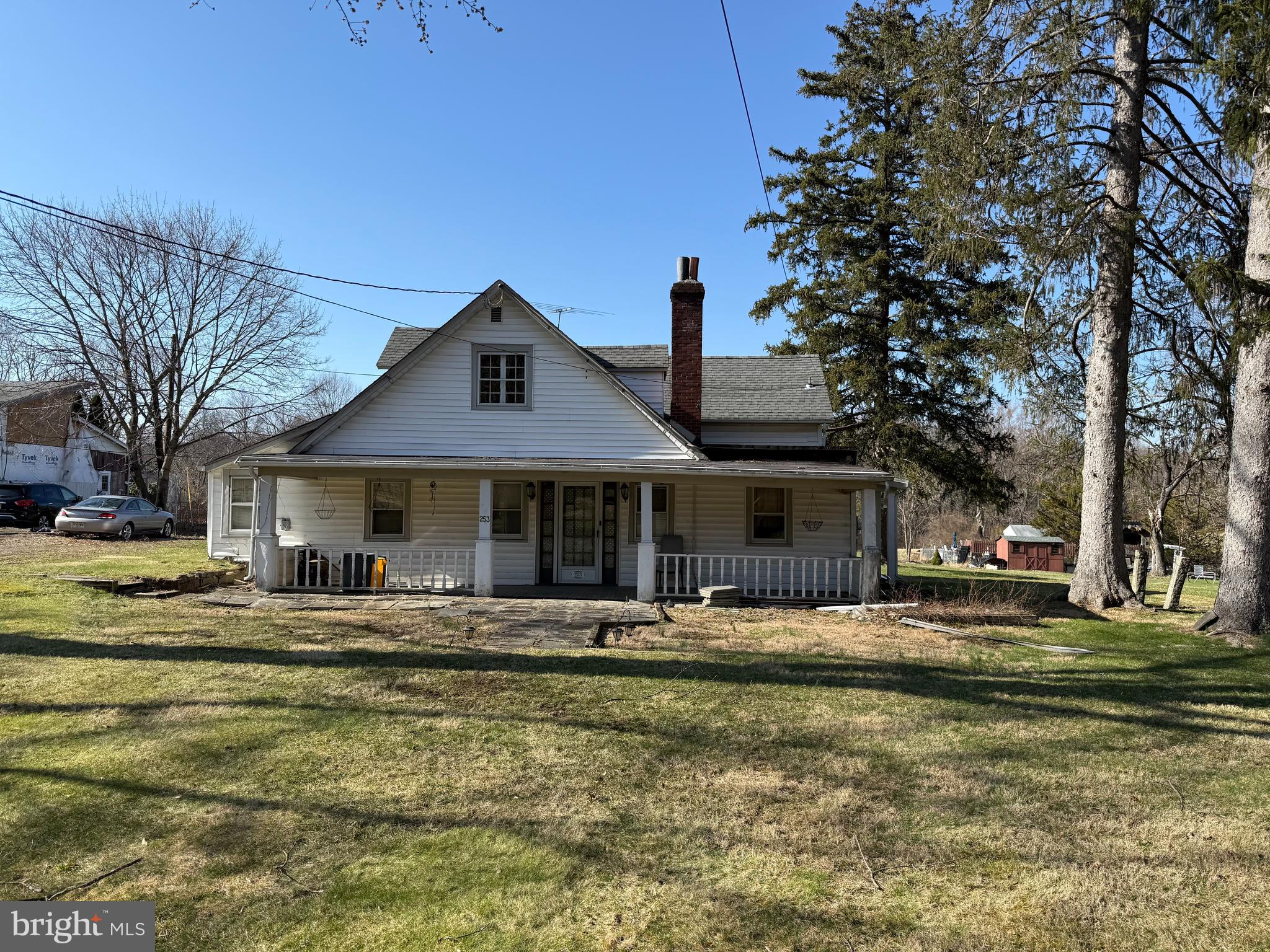 253 Penn Hopewell Road Hopewell, NJ 08525 - Photo 2 of 9 a front view of a house with a yard
