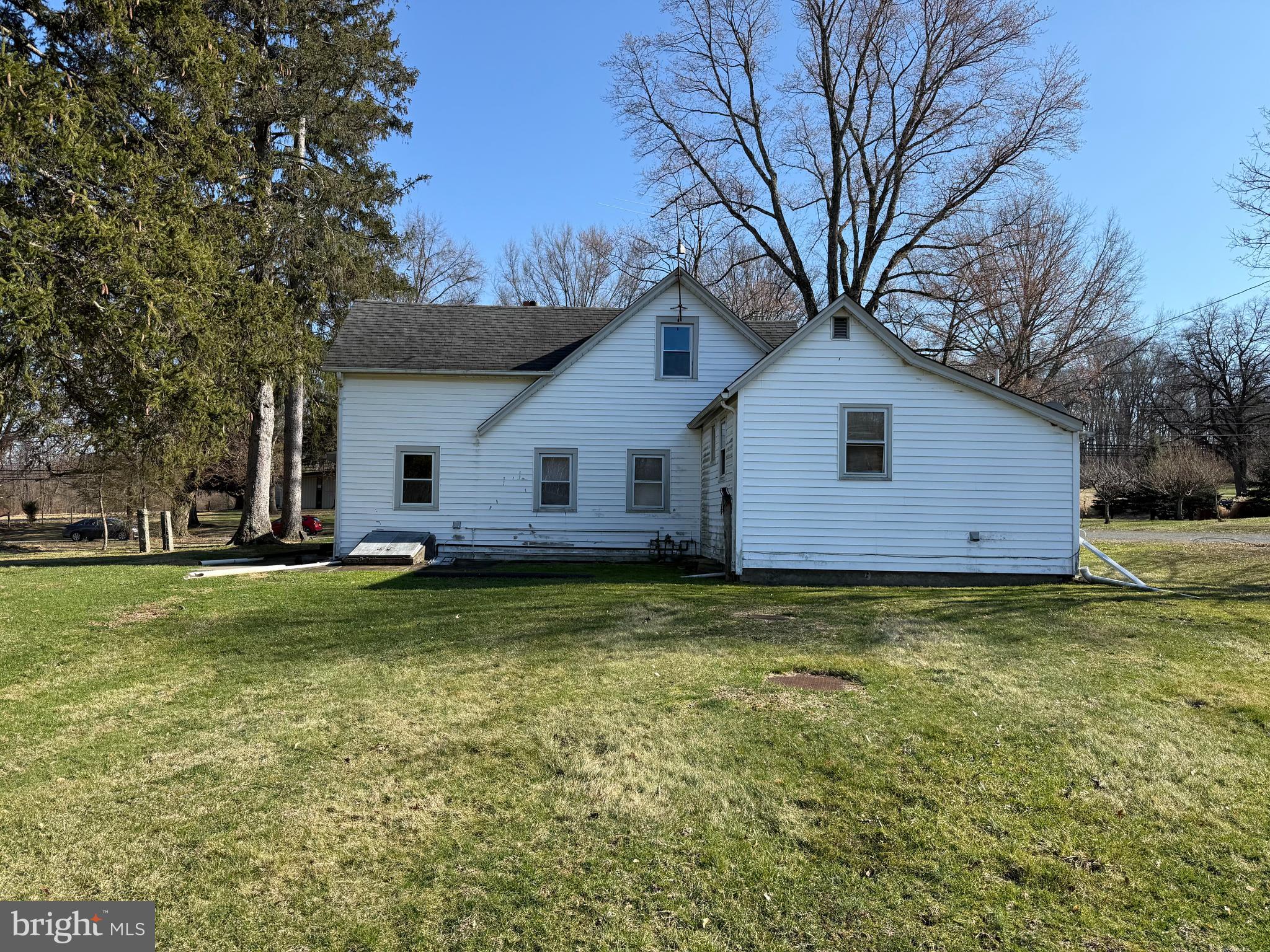 253 Penn Hopewell Road Hopewell, NJ 08525 - Photo 3 of 9 a view of a house with a yard