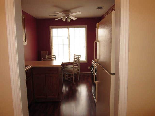 2426 Raleigh Court, Unit 6 Schaumburg, IL 60193 - Photo 7 of 18 a view of a livingroom with furniture window