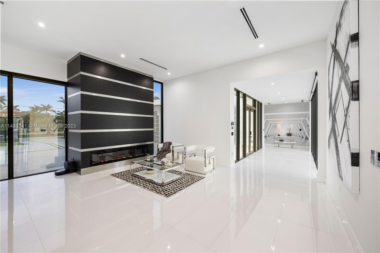 13310 Southwest 34th Street Miami, FL 33175 - Photo 12 of 54 a kitchen with sink refrigerator and window