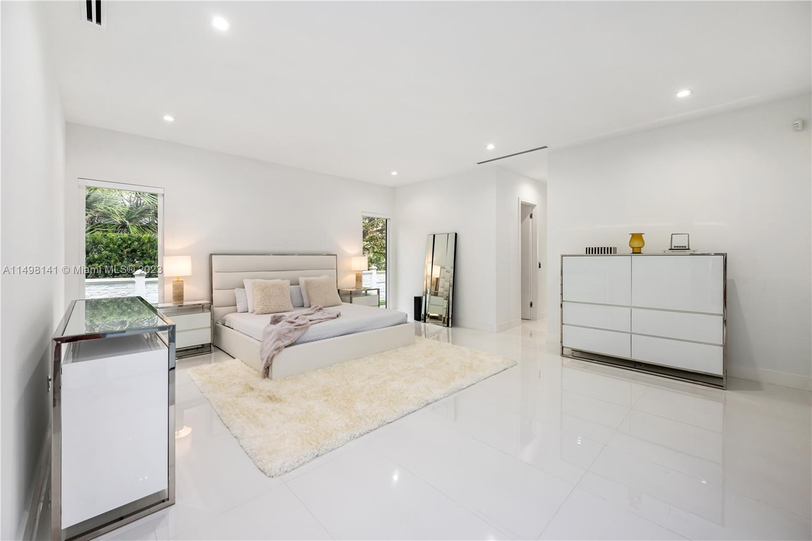 13310 Southwest 34th Street Miami, FL 33175 - Photo 16 of 54 a bedroom with a bed and a couch