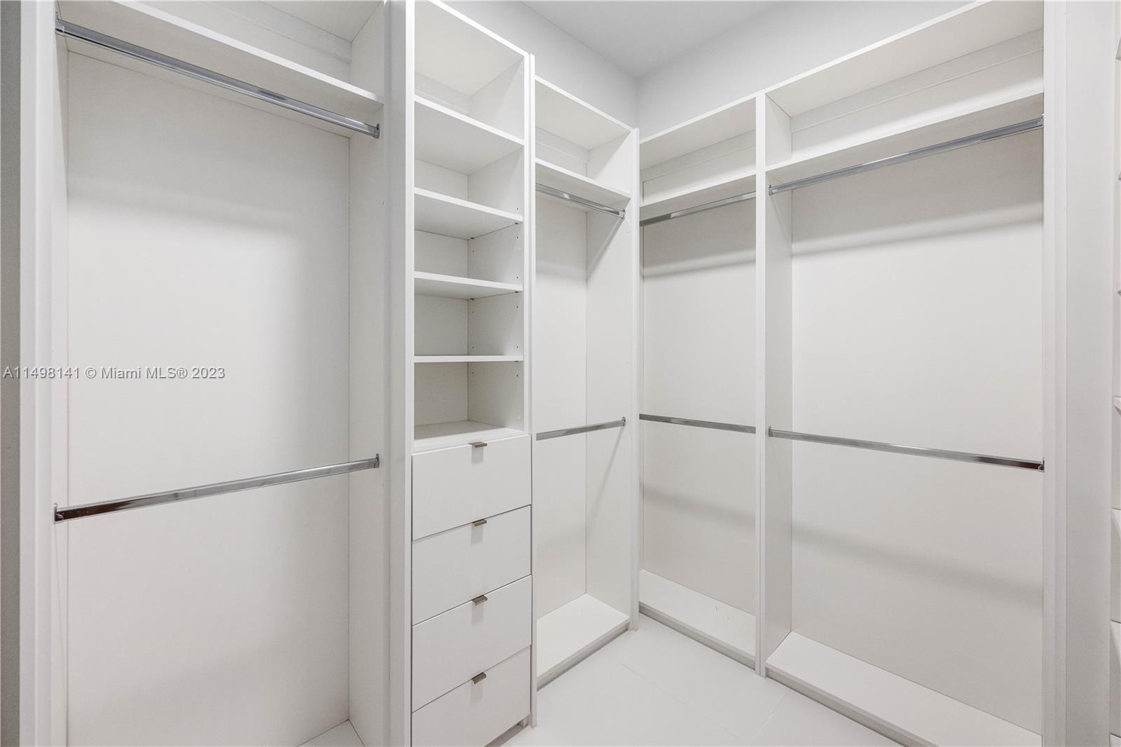 13310 Southwest 34th Street Miami, FL 33175 - Photo 20 of 54 a view of an empty walk in closet
