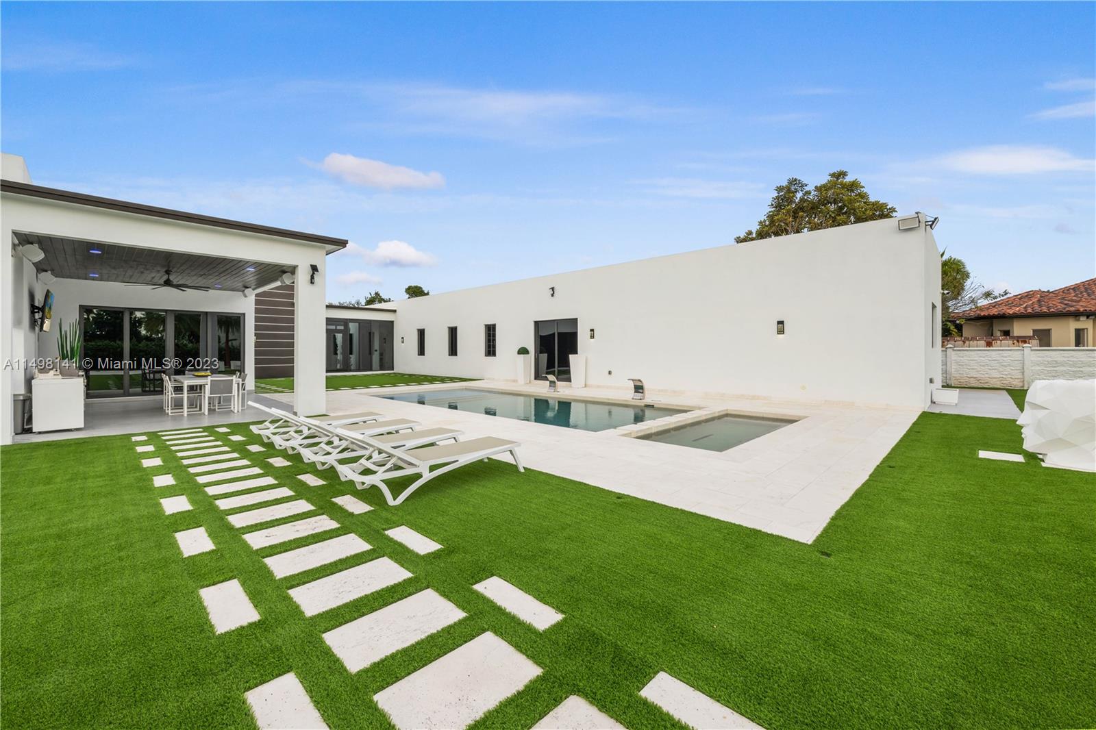 13310 Southwest 34th Street Miami, FL 33175 - Photo 34 of 54 a front view of a house with a yard