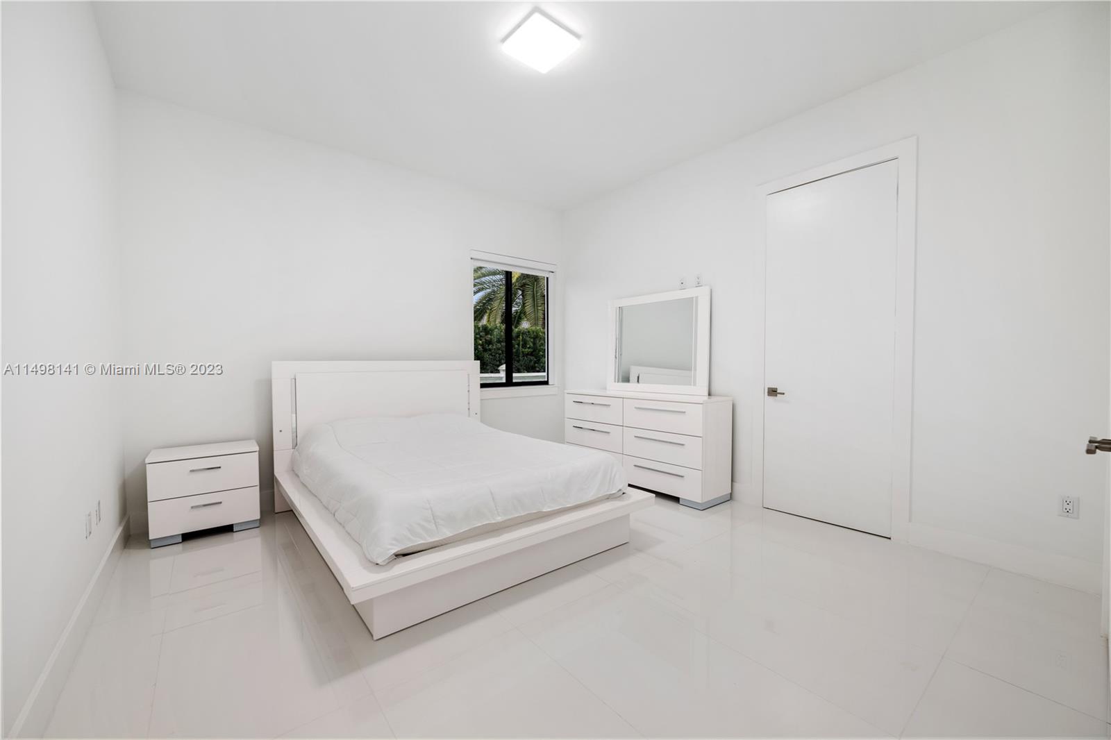 13310 Southwest 34th Street Miami, FL 33175 - Photo 43 of 54 a large white bed in a white room