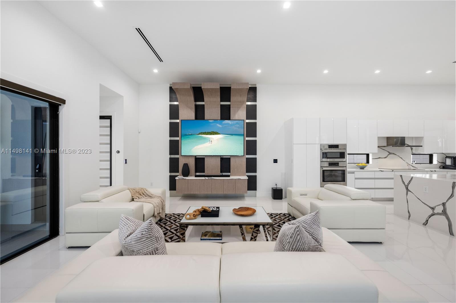 13310 Southwest 34th Street Miami, FL 33175 - Photo 48 of 54 a living room with furniture and a large window