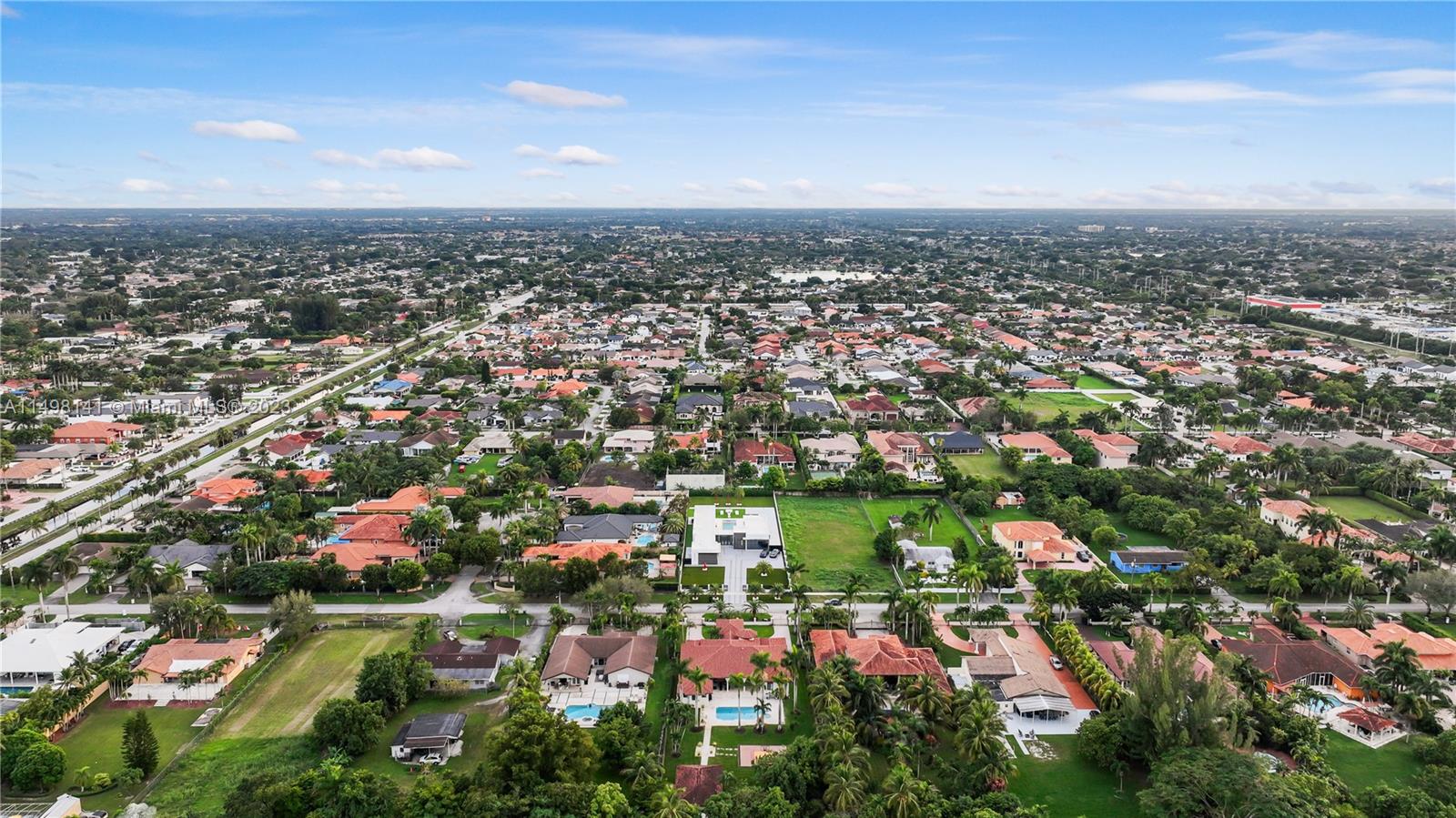 13310 Southwest 34th Street Miami, FL 33175 - Photo 54 of 54 an aerial view of residential houses with city view