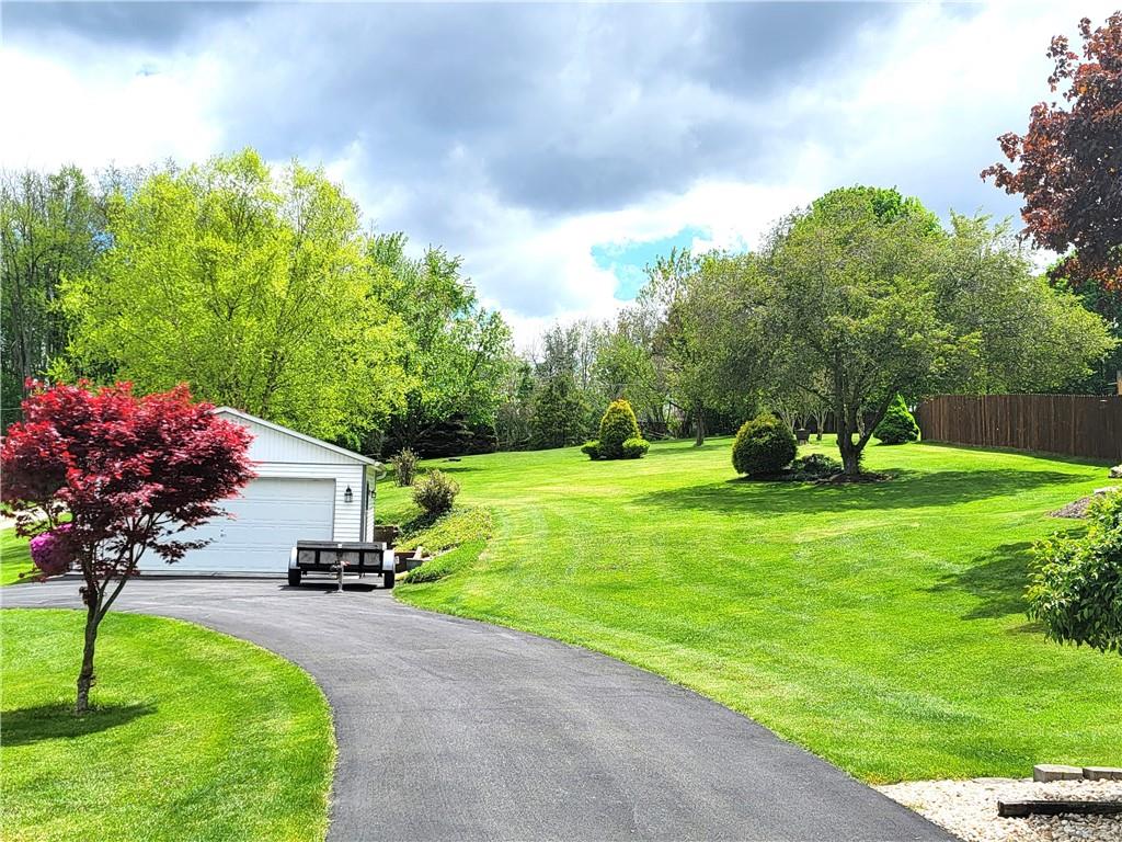 778 Herman Road Butler, PA 16002 - Photo 23 of 23 a view of a garden with a slide