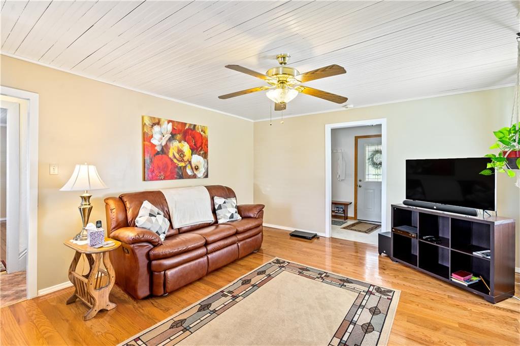 778 Herman Road Butler, PA 16002 - Photo 3 of 23 a living room with furniture and a flat screen tv