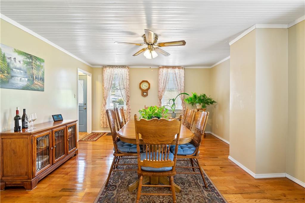 778 Herman Road Butler, PA 16002 - Photo 5 of 23 a view of a dining room with furniture and wooden floor