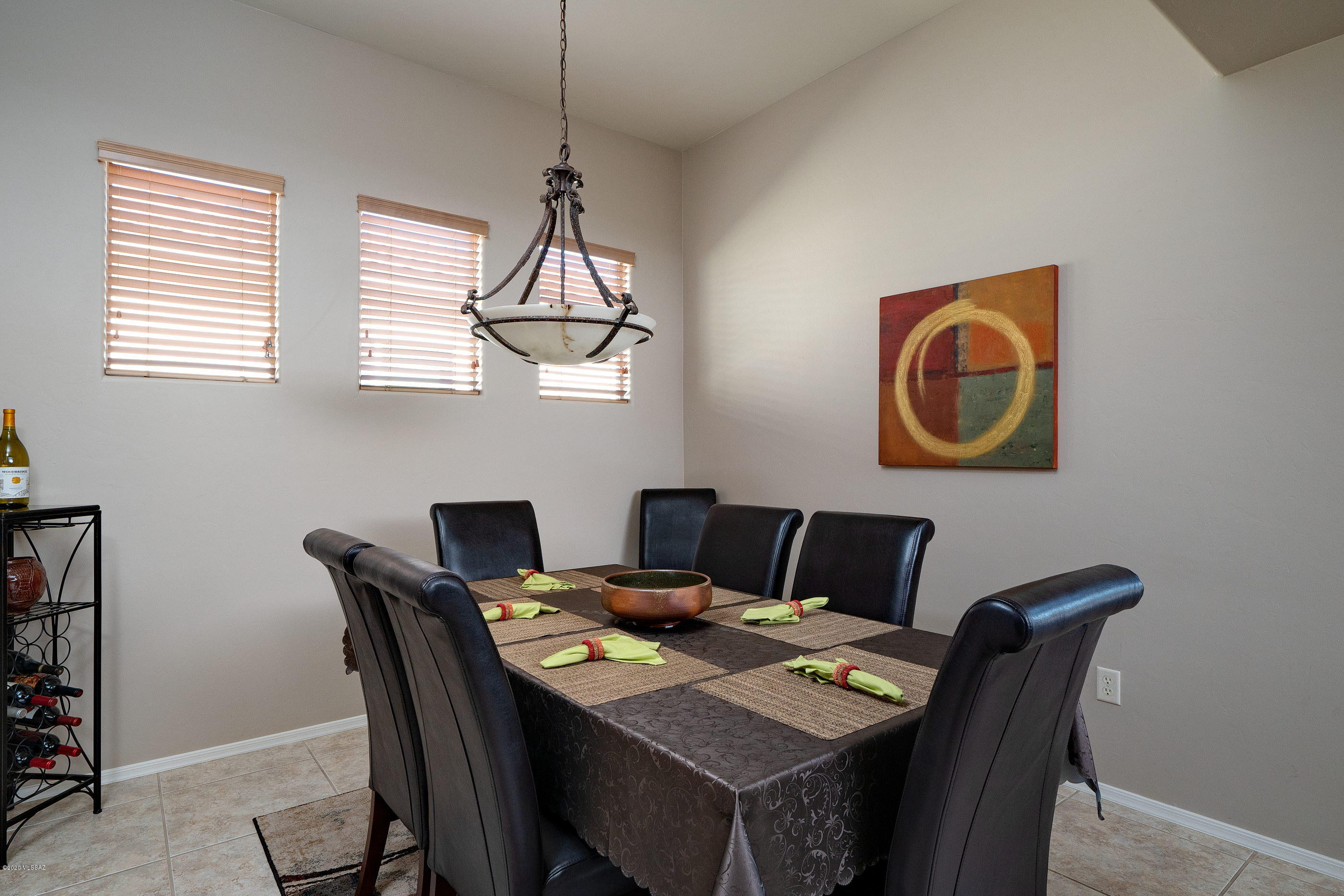 4440 West Crystal Ranch Place Marana, AZ 85658 - Photo 16 of 28 a view of a dining room with a table and chairs