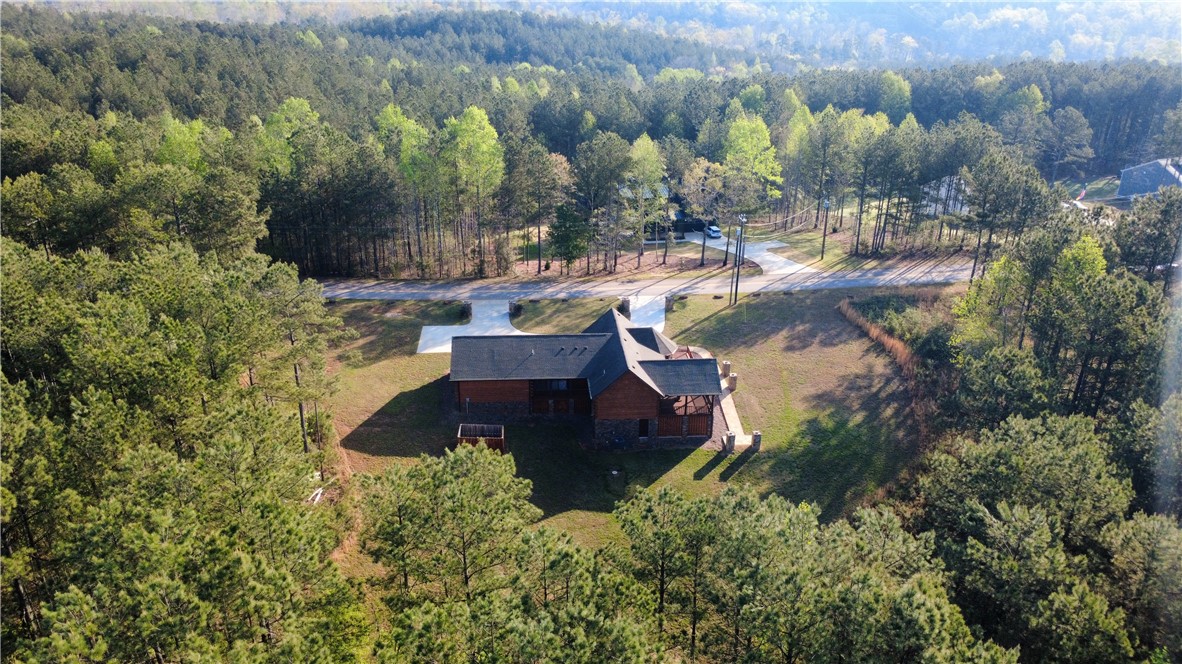 128 McAlister Road West Union, SC 29696 - Photo 39 of 40 Nestled among towering pines, this home offers serene privacy and a sprawling driveway.