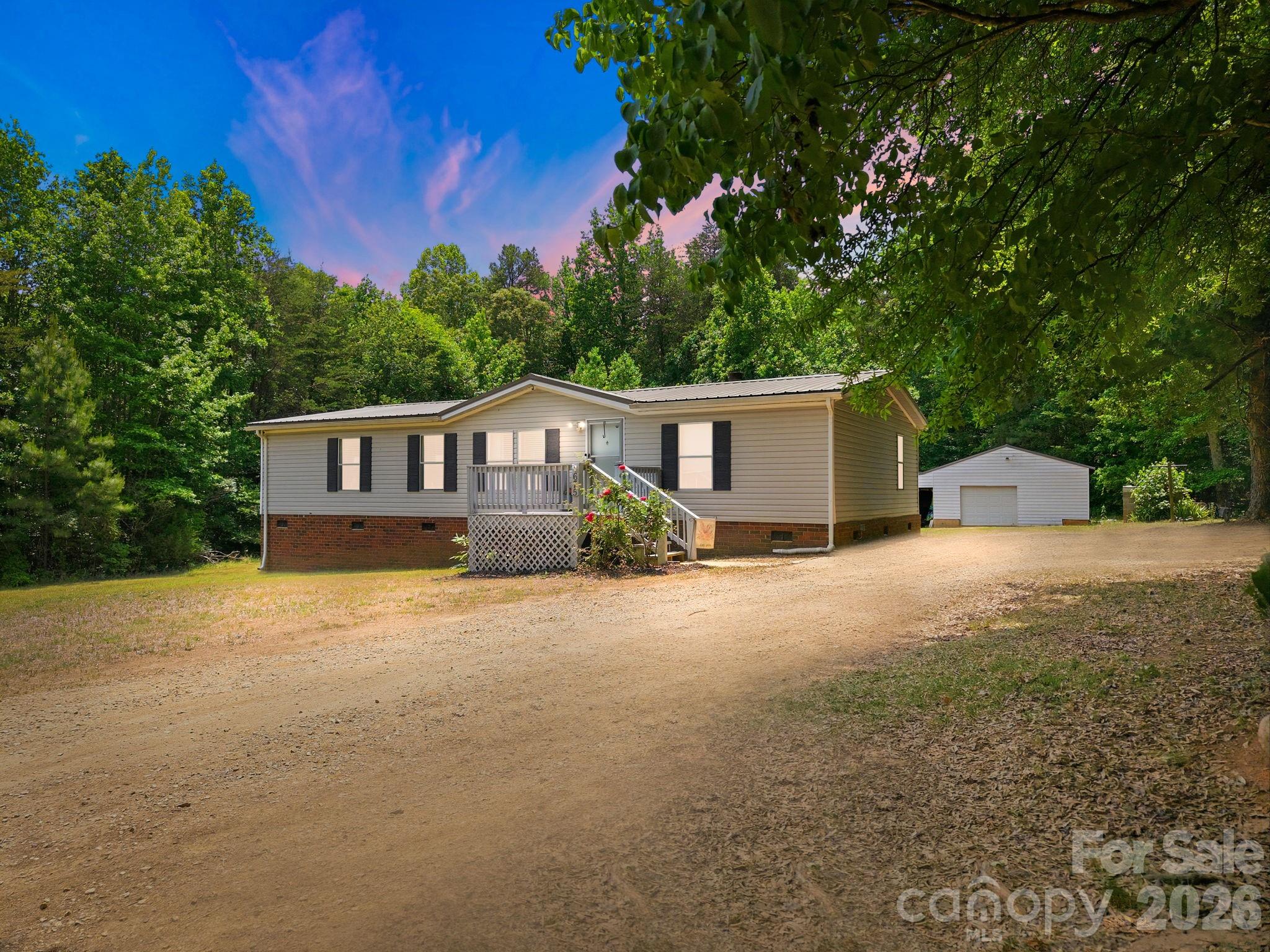 675 Overcash Road Salisbury, NC 28147 - Photo 1 of 48 a front view of a house with a yard and garage
