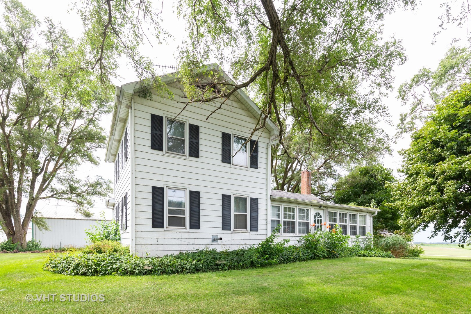 49W179 Main Street Road Maple Park, IL 60151 - Photo 1 of 21 a front view of a house with a yard