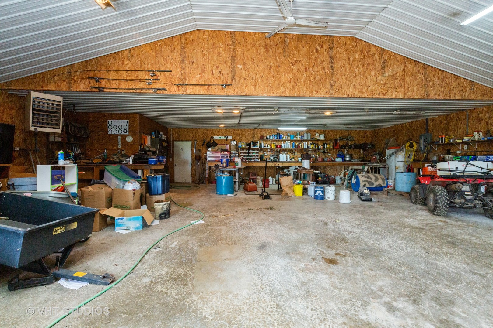 49W179 Main Street Road Maple Park, IL 60151 - Photo 14 of 21 a view of a garage with a table and chairs