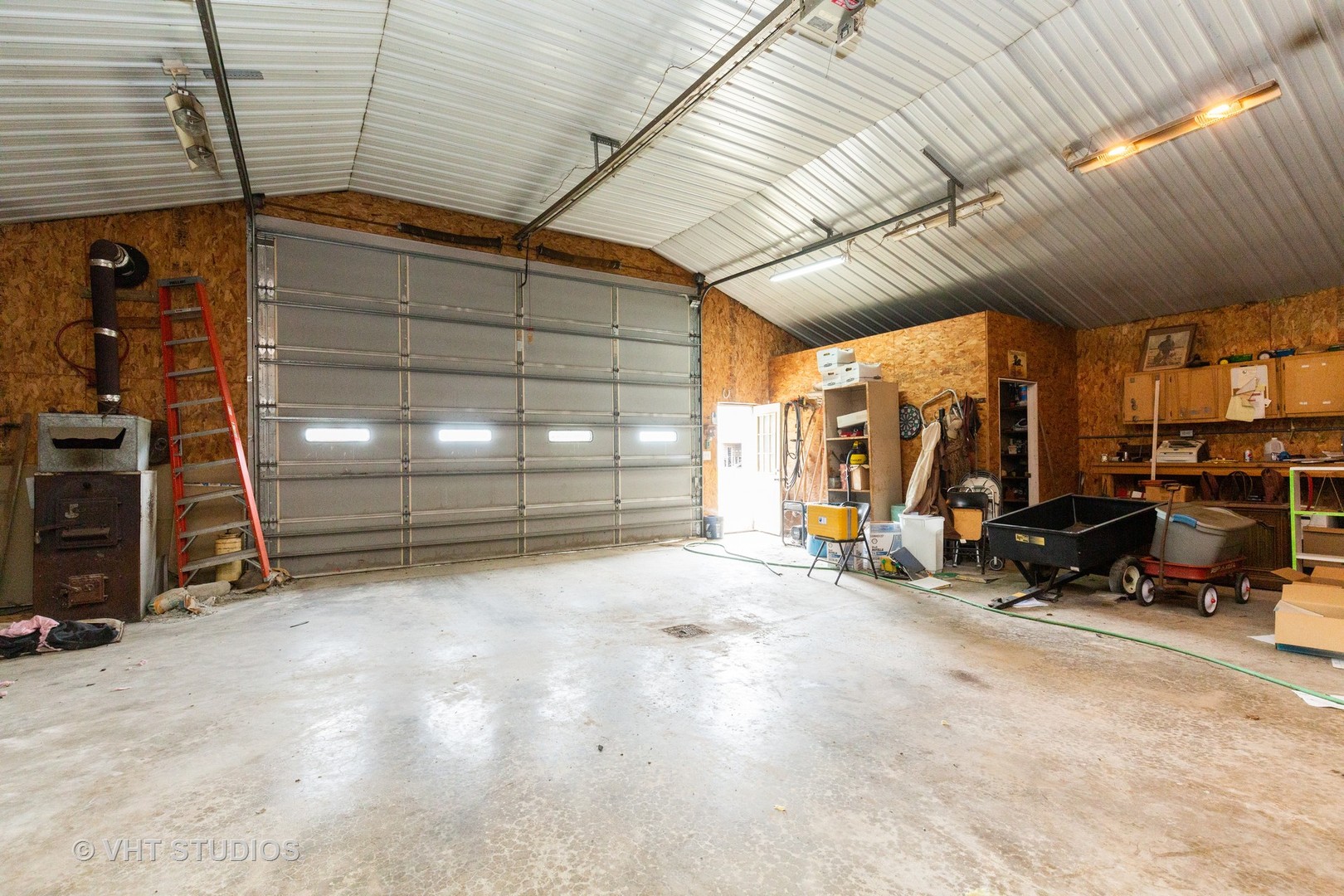 49W179 Main Street Road Maple Park, IL 60151 - Photo 15 of 21 a view of a garage with stuff