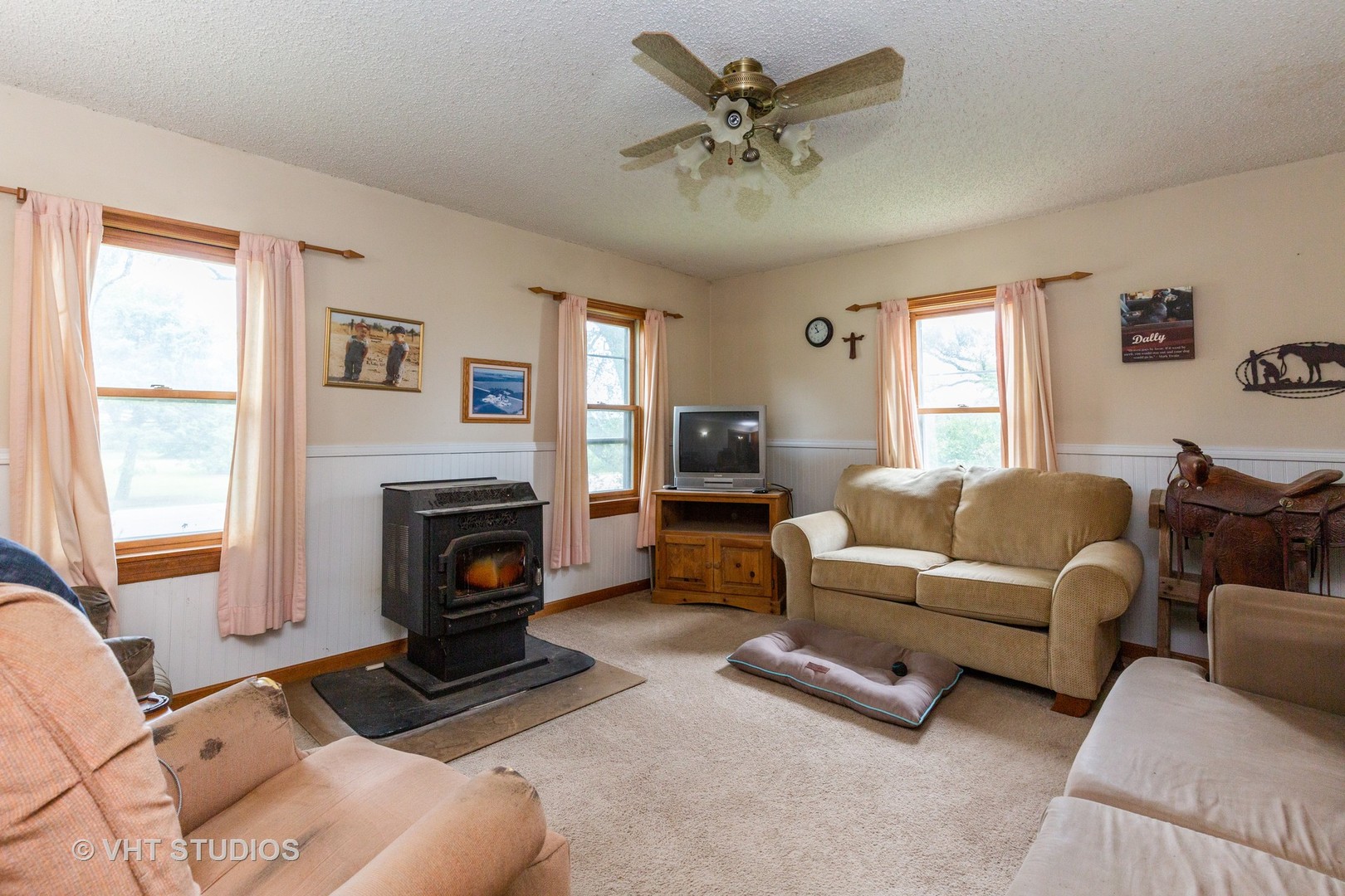 49W179 Main Street Road Maple Park, IL 60151 - Photo 8 of 21 a living room with furniture a window and a fireplace