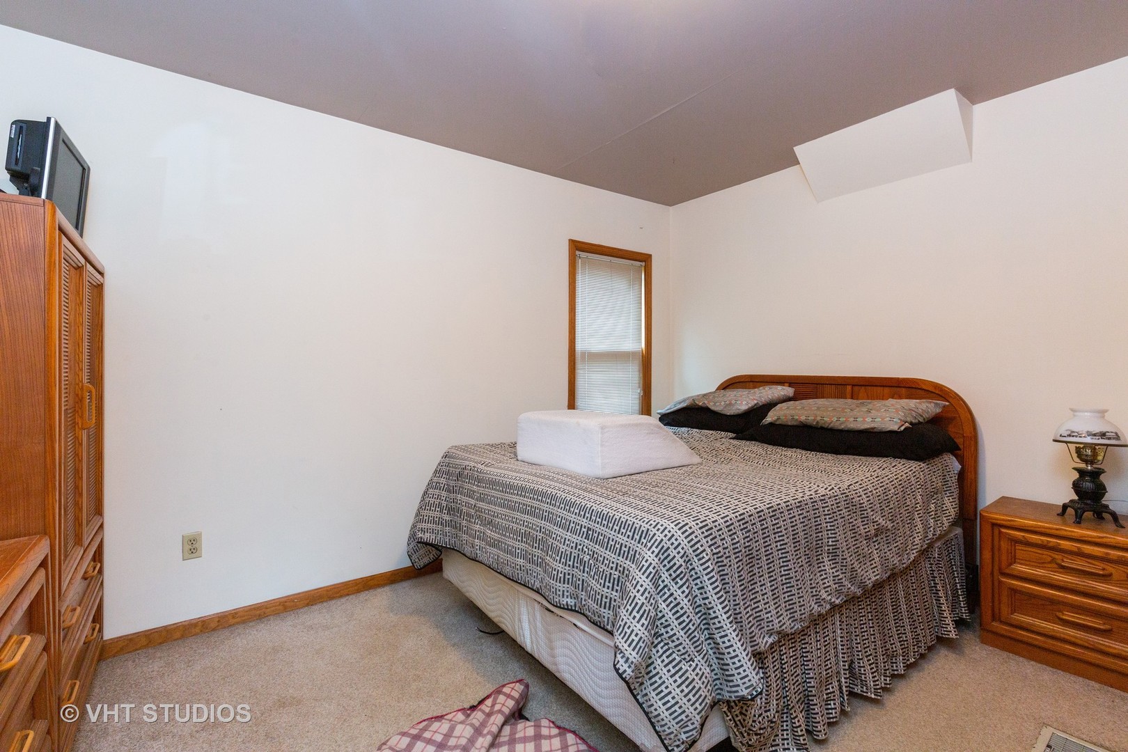 49W179 Main Street Road Maple Park, IL 60151 - Photo 9 of 21 a bedroom with a bed and dresser