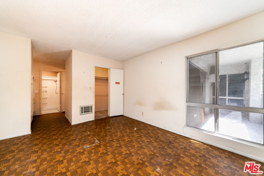 355 South Los Robles Avenue, Unit 108 Pasadena, CA 91101 - Photo 19 of 28 wooden floor in an empty room