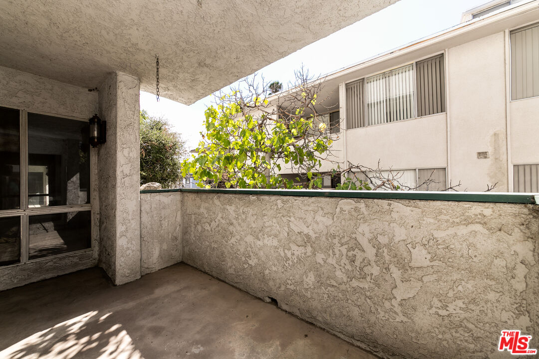 355 South Los Robles Avenue, Unit 108 Pasadena, CA 91101 - Photo 22 of 28 a view of a door and a window