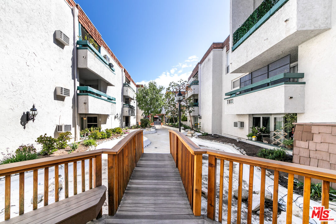 355 South Los Robles Avenue, Unit 108 Pasadena, CA 91101 - Photo 24 of 28 a view of a street with tall buildings