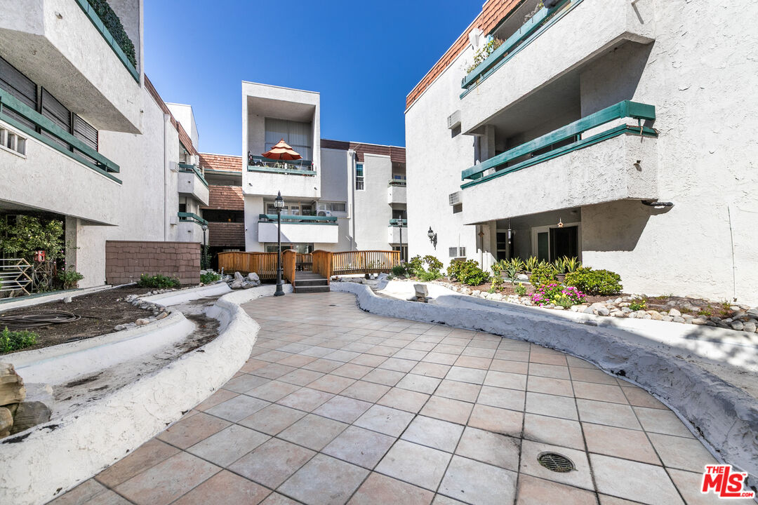 355 South Los Robles Avenue, Unit 108 Pasadena, CA 91101 - Photo 25 of 28 a view of living room filled with furniture
